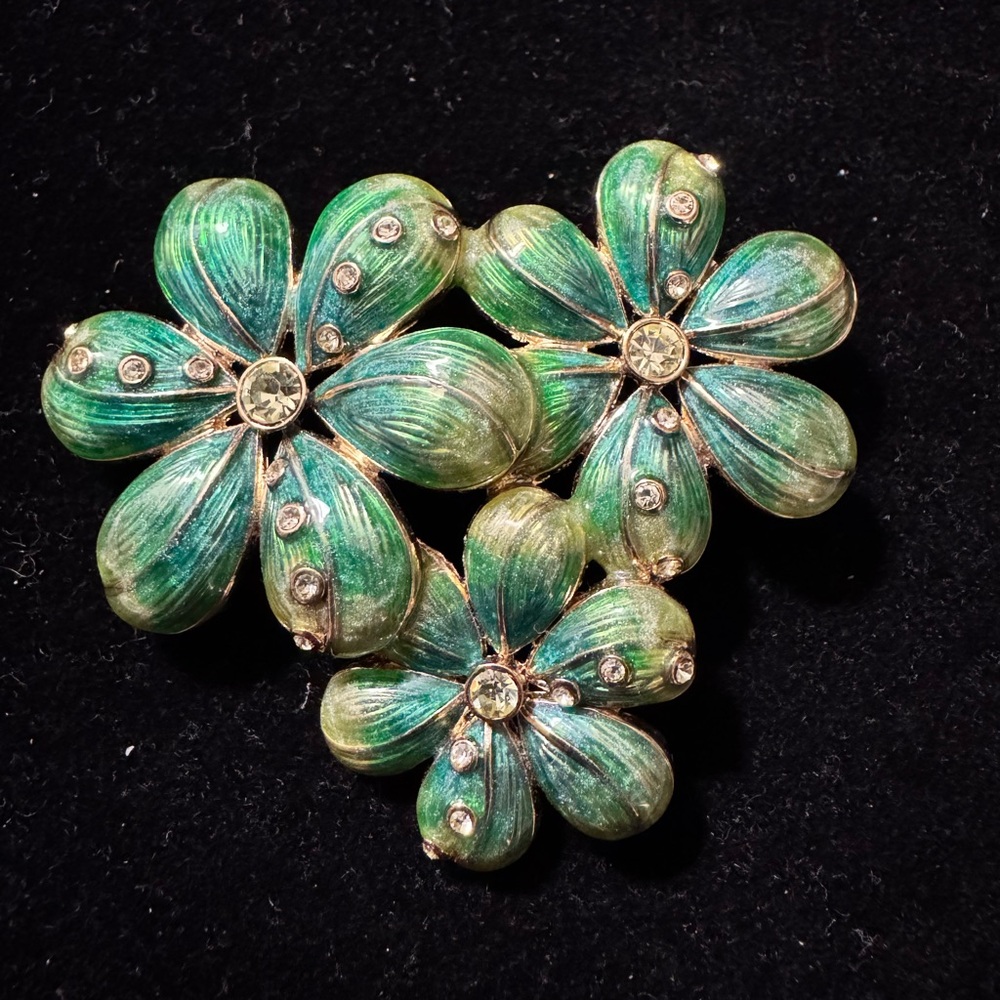 Vintage Monet Green Floral Brooch In Gold Tone Setting With Clear Rhinestones